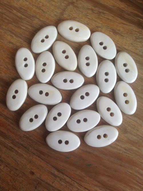 Small cow horn buttons