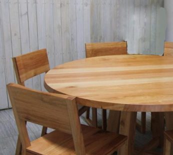 Round dining table with chairs by Inwood