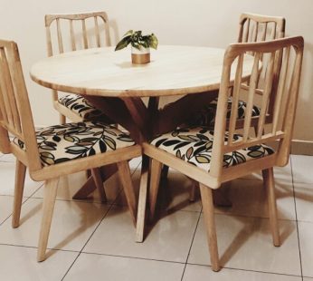 Round dining table with chairs by Inwood